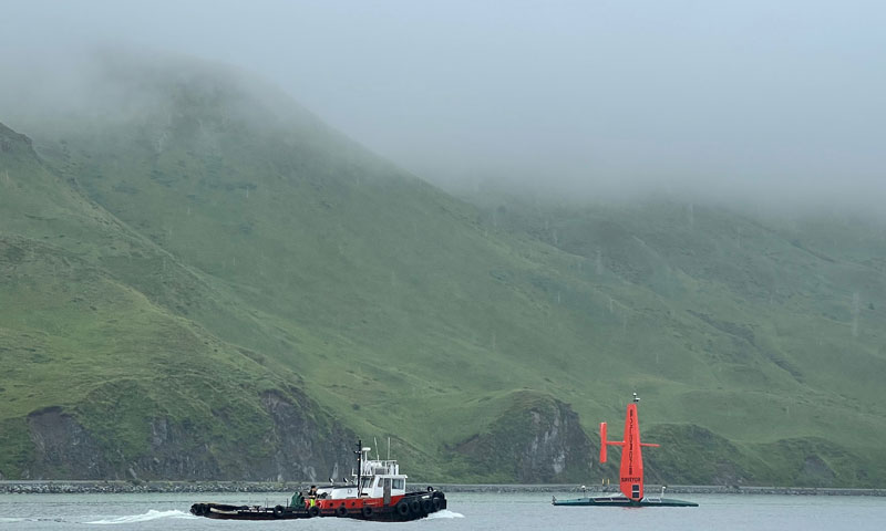The Saildrone Surveyor in Alaska's Dutch Harbor at the beginning of the Aleutians Uncrewed Ocean Exploration expedition